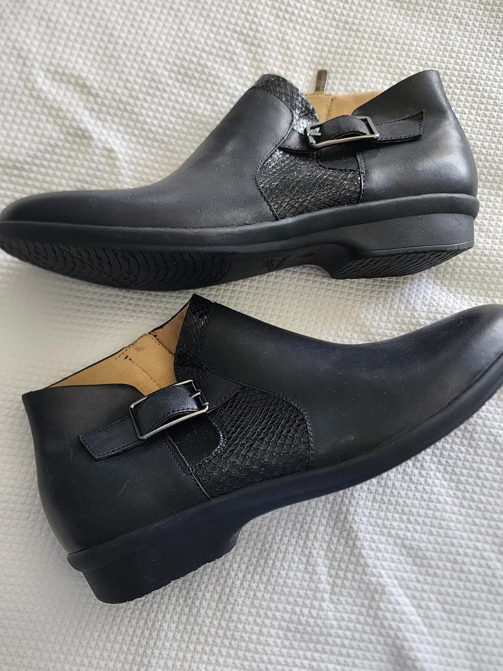 Dansko black leather ankle Boots with side buckle and textured panel